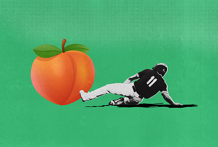 A man performing a baseball slide into a peach.