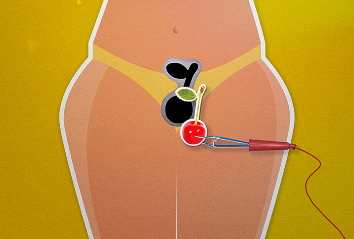 A cherry is being placed in the pelvic region of a female body in a mock operation game.