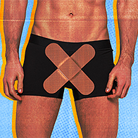 Two band-aids are making an X over the crotch of a man.