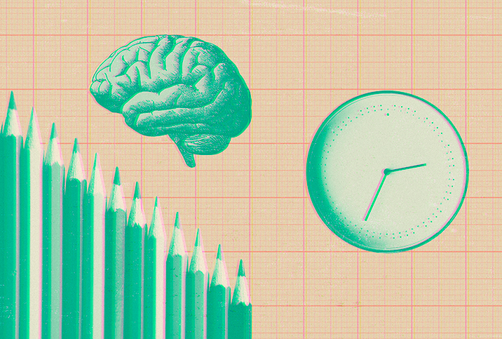 A brain, clock, and pencils on top of graph paper.