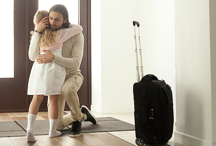 A-divorced-man-hugs-daughter-before-she-leaves