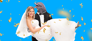 bride-being-held-by-groom-with-dolphin-head
