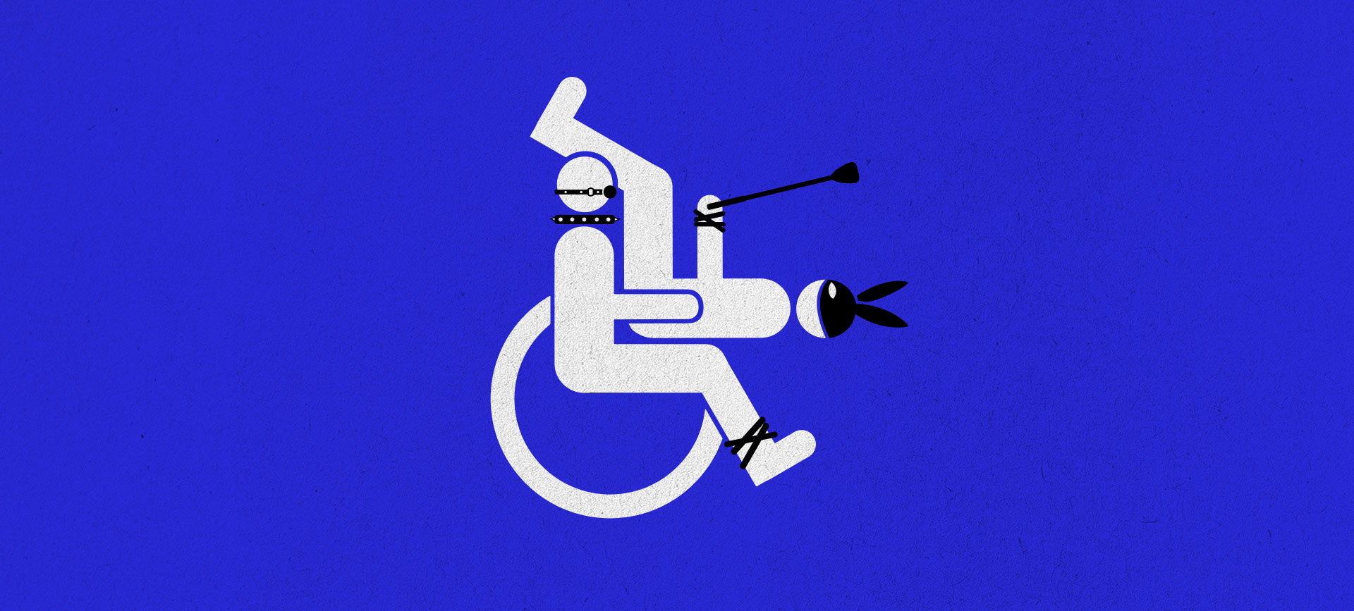 Two-people-in-bondage-have-sex-in-one-wheelchair-that-looks-like-the-handicap-symbol