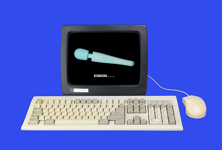 A keyboard and mouse sit in front of a computer screen showing a wand vibrator.