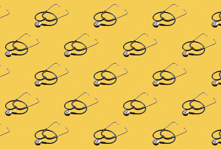 Identical stethoscope images cover a yellow background.