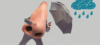 A nose with arms and legs hold an umbrella against a rain cloud.