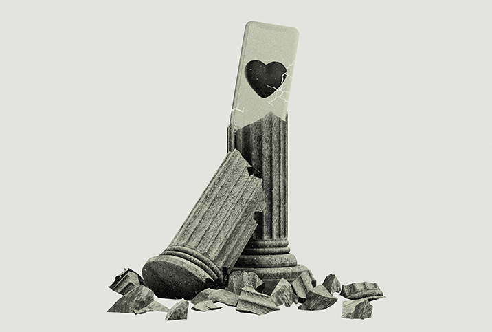 A broken Roman column reveals a cellphone with a heart on the back. 