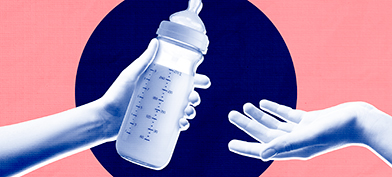 One arm is reaching out to hand a bottle of breast milk to another.