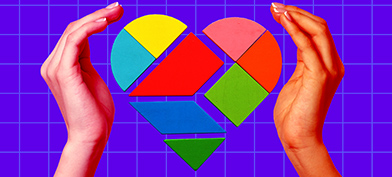 Two hands surround geometric pieces that form a heart.