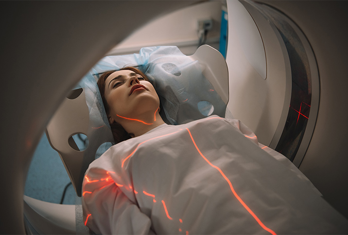 A woman is undergoing an MRI to detect endometriosis and adenomyosis.