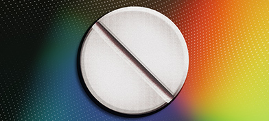 A while pill sits against a multicolored background with white dots.