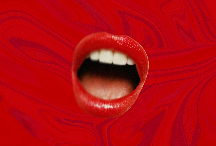 An open mouth with red lips is on a swirled red background. 