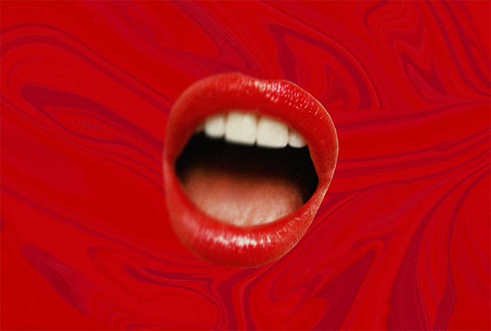 An open mouth with red lips is on a swirled red background.