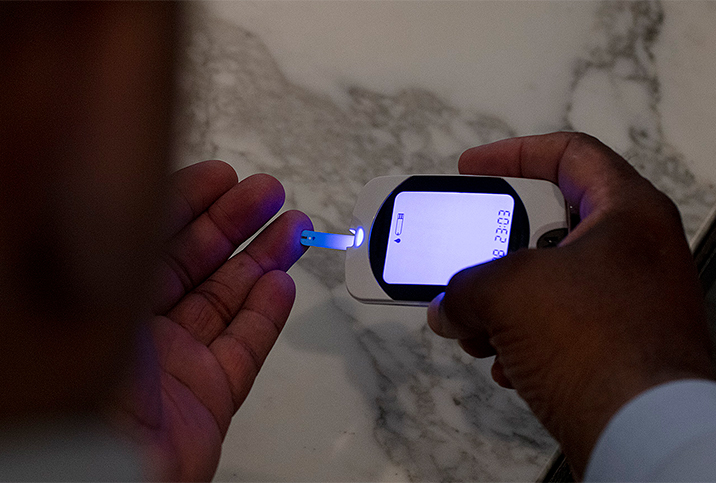 A man with diabetes checks his insulin levels.