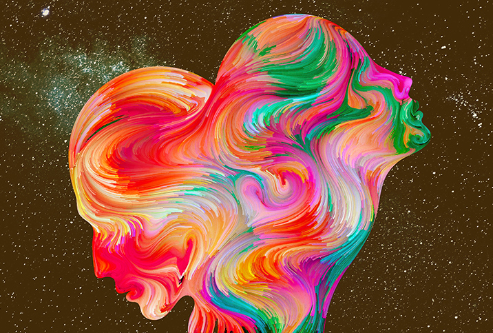 A combined profile of male and female heads mixed with multicolor swirls sit against a starry background.