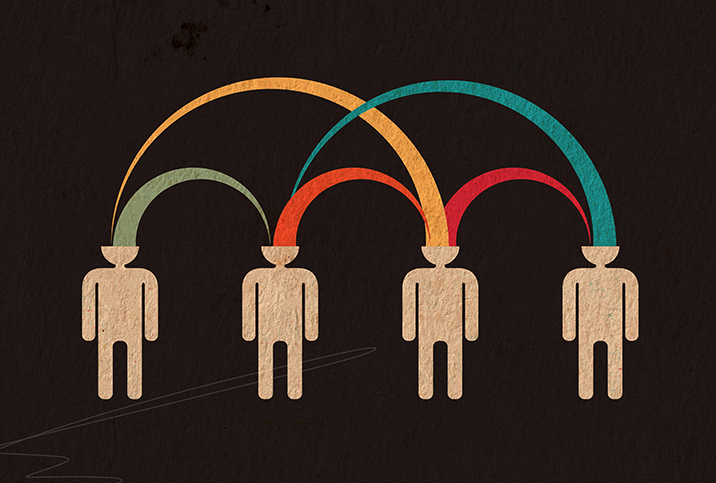 Four stick people's heads are connected by colorful, arched line.