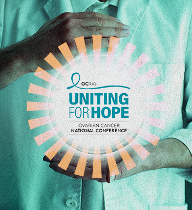 Two hands hold a floating logo for the OCRA conference.