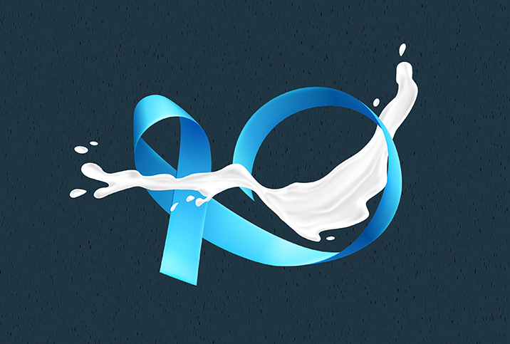 A splash of white semen lays over a blue prostate cancer ribbon.