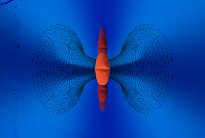 An trio of orange pills sits in the middle of a vortex frame against a blue background.