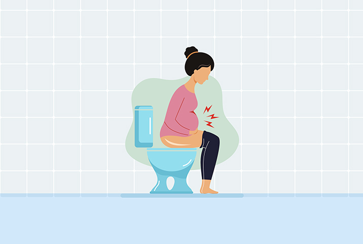 A pregnant woman sits on a toilet, holding her belly, with red lightning surrounding the baby bump.