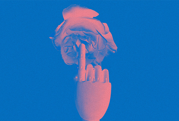 A pink robotic finger touches the center of a pink rose against a blue background.