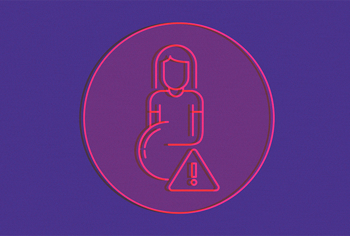 Pink neon lights on a purple background outline a pregnant figure and a triangular warning symbol.