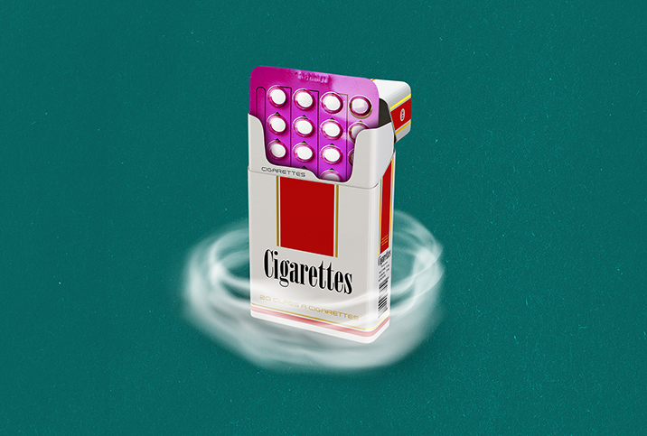 An open pack of cigarettes reveals a pack of birth control on the inside.