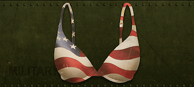 A bra with an American flag pattern for fabric is against an army green metal wall.