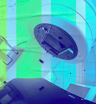 An MRI machine has an overlay of several gradient color bars ranging from yellow to blue.