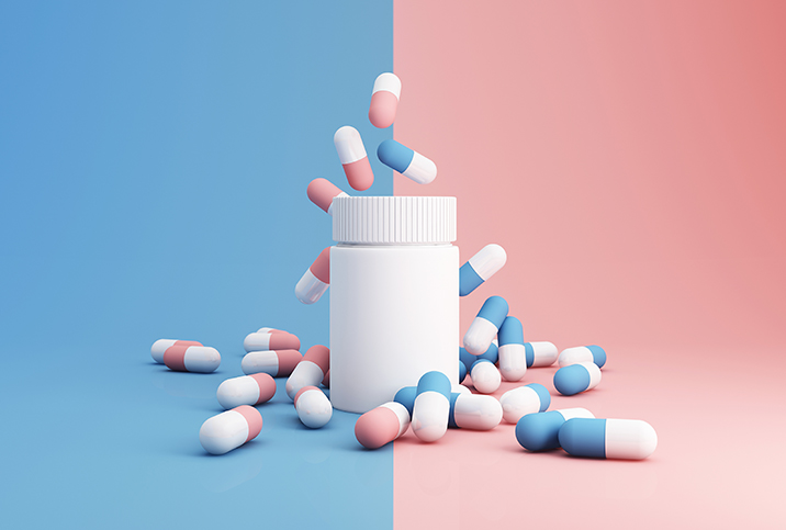 A bottle of antibiotics on a pink and blue background.