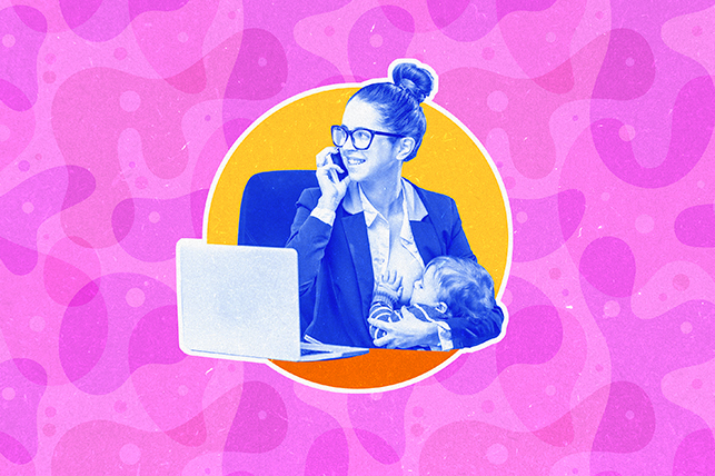 A working mother nurses at her desk while on the phone.