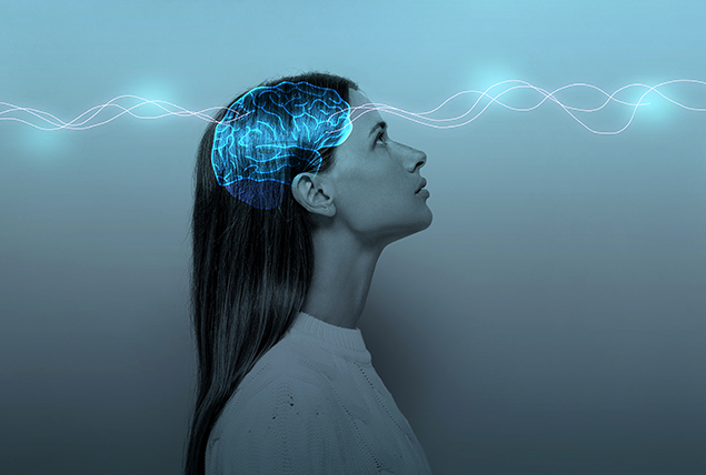 A blue outline of a brain glows inside the head of a woman as a white ribbon runs through it.