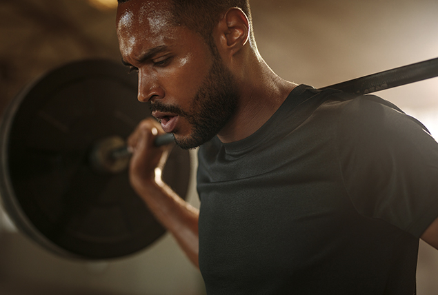 A man is lifting weights.