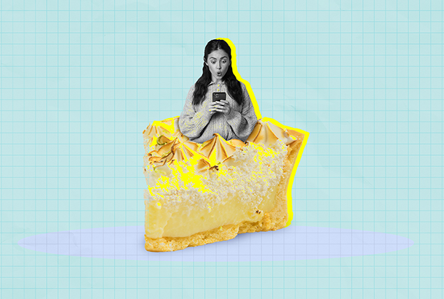 A woman who is looking at her cellphone pops up out of a piece of lemon meringue pie.