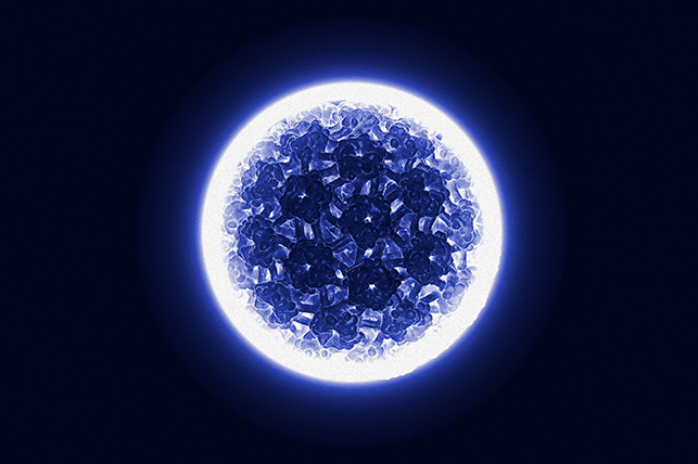 a glowing blue orb with a geometric pattern on a black background