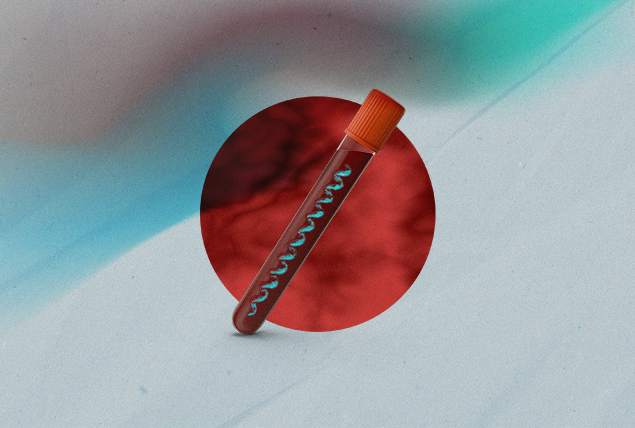 A blood sample lays over a circular drop of blood.