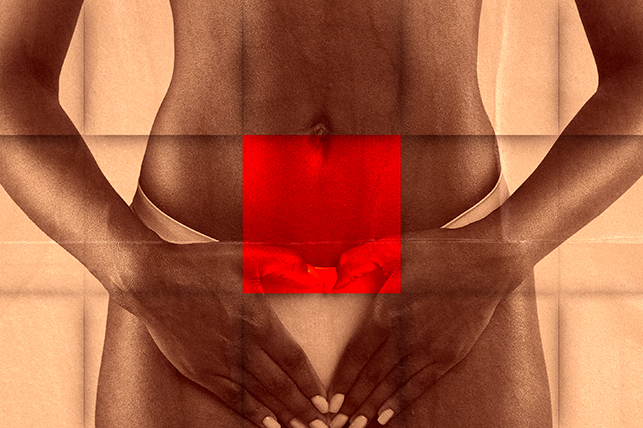 The abdomen of a woman has a red square over it.