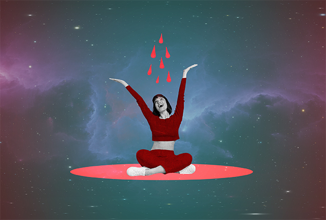 woman sits crossed legs on red circle looks happy with her arms over her head with red droplets above on a galaxy background