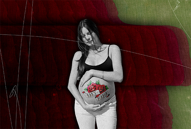 pregnant woman holds her belly with a tattoo reading Baby Mama on a dark red background