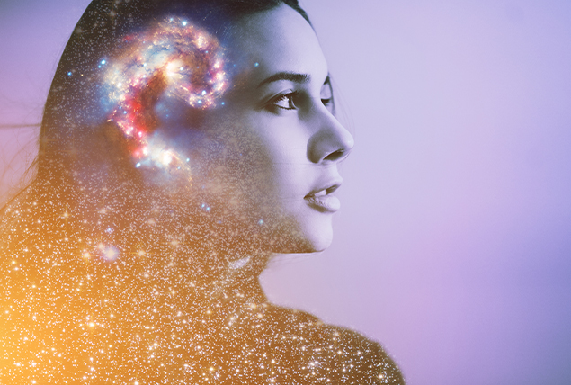 A woman looks out towards the right as her brain glows iridescent inside of her head.