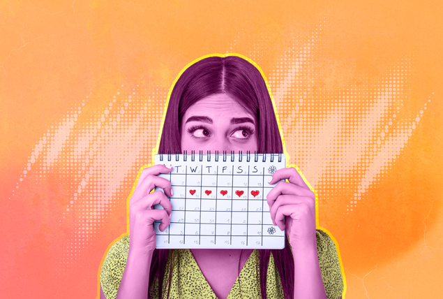 woman with pink tint holds up calendar over her face with hearts marking days on an orange backgroun d