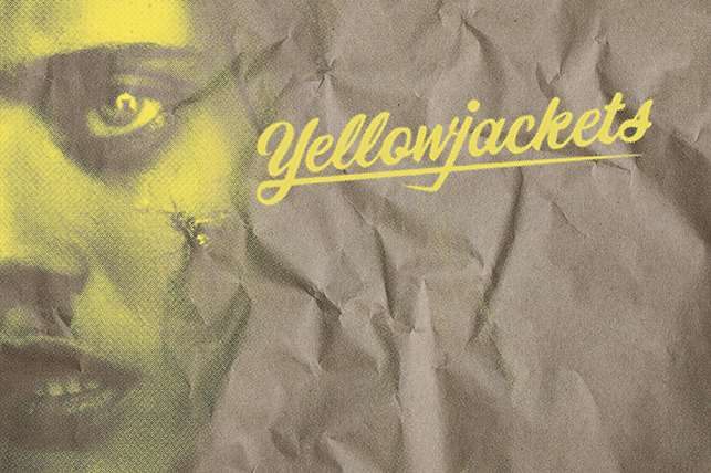 A yellow face is next to the show title Yellowjackets against a brown background.
