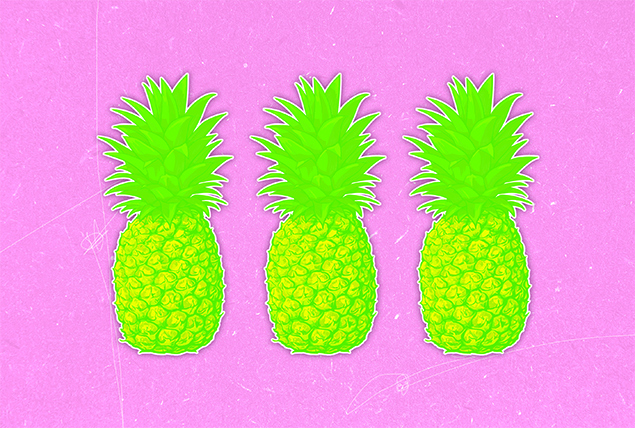Three lime green-yellow pineapples are in a row on a pink background.