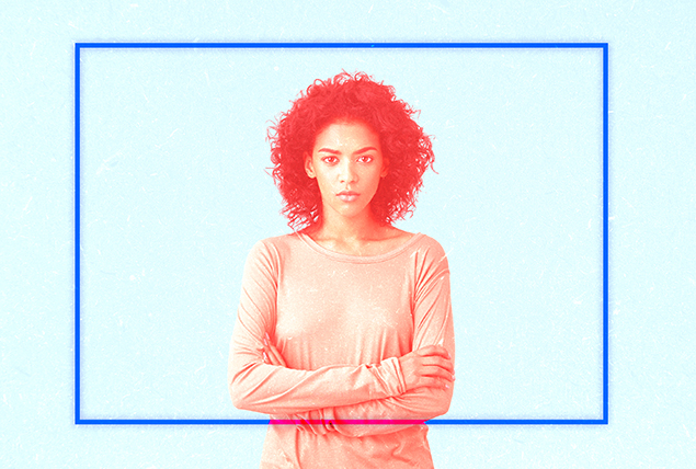 A woman standing with her arms folded is framed by a blue square against a light blue backgorund.