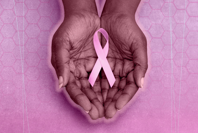 hands holding pink Breast Cancer ribbon on pink hexagon background