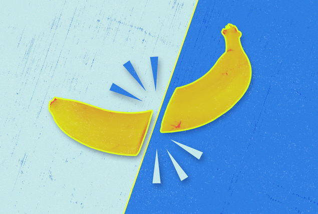 yellow banana broken in half with light blue background on one side of the split and dark blue on the other