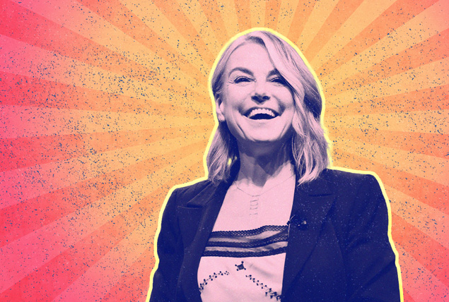 Esther Perel with pink tint on pink and orange sunburst background