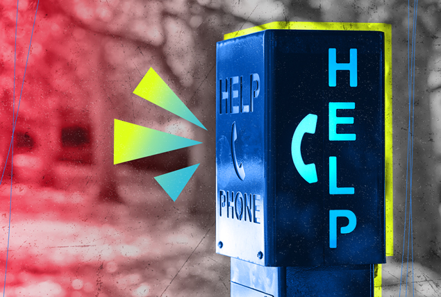 blue 'Help' phone booth with green triangles on red tinted college campus