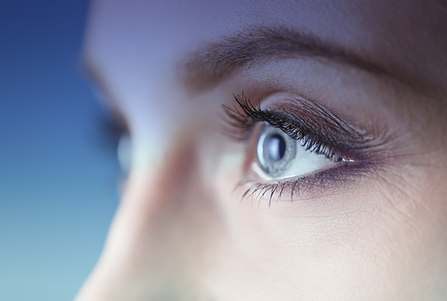 The eyes of a woman are shown up close.