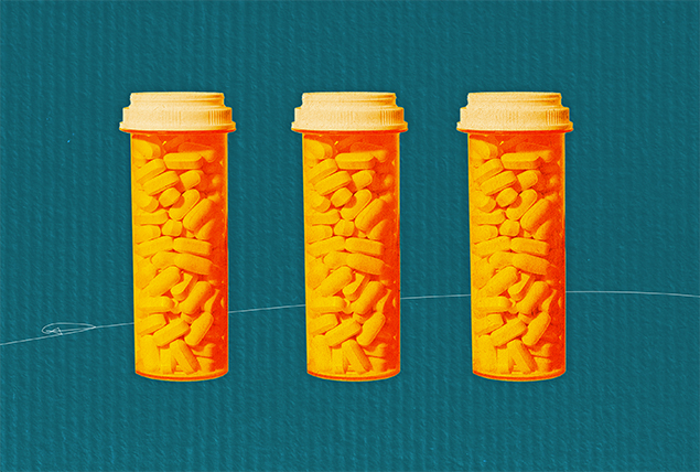 Three pill bottles full of white medication are against a teal background.